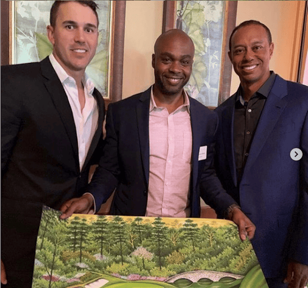 Valentino with Tiger Woods.